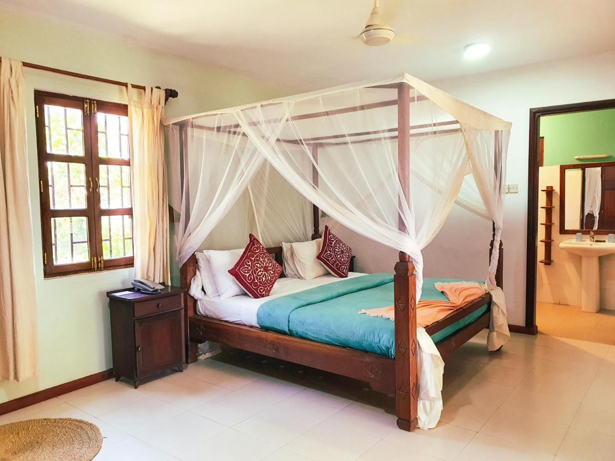 Flame Tree Cottages Нунгви Екстериор снимка