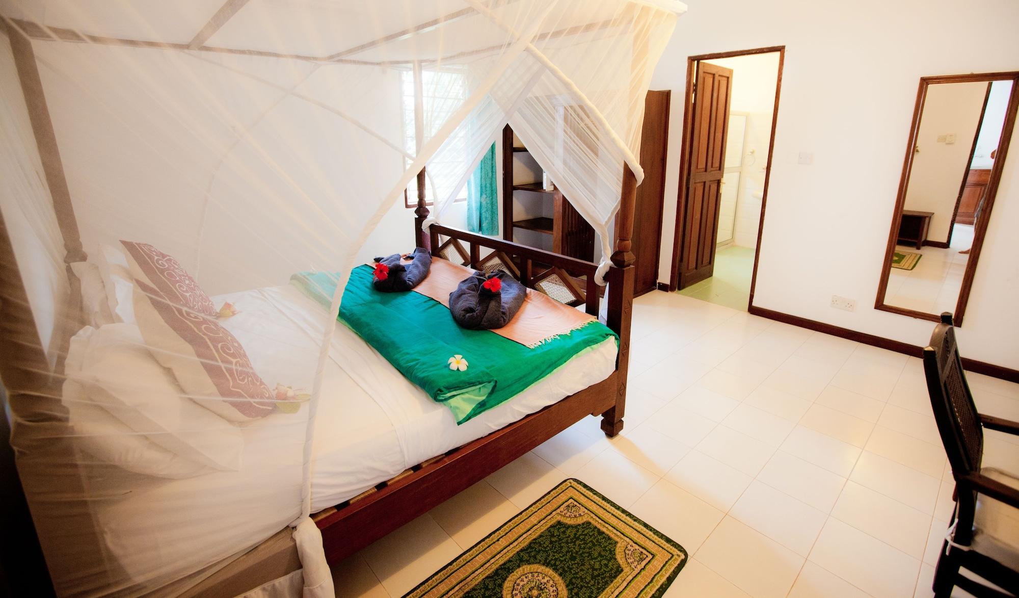 Flame Tree Cottages Нунгви Екстериор снимка
