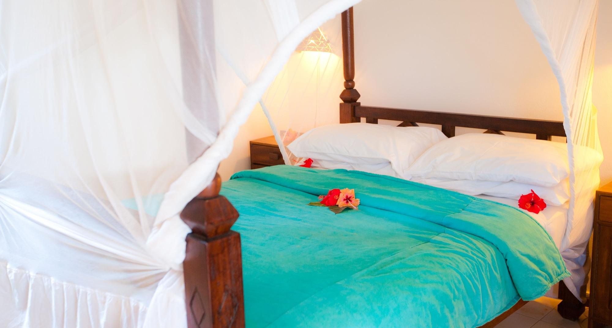 Flame Tree Cottages Нунгви Екстериор снимка